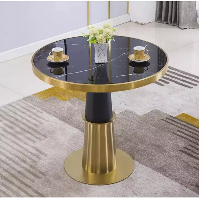 Tavoline me bazament metalik gold .Syprine porcelan, rezistente ndaj gervishtjeve dhe kushteve atmosferike. Diametri 60 cm
